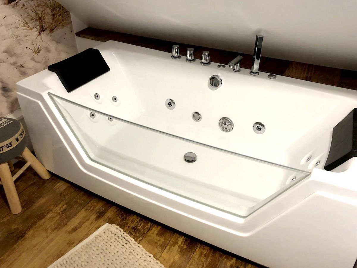 Pose et branchement baignoire balnéo dans une chambre parentale